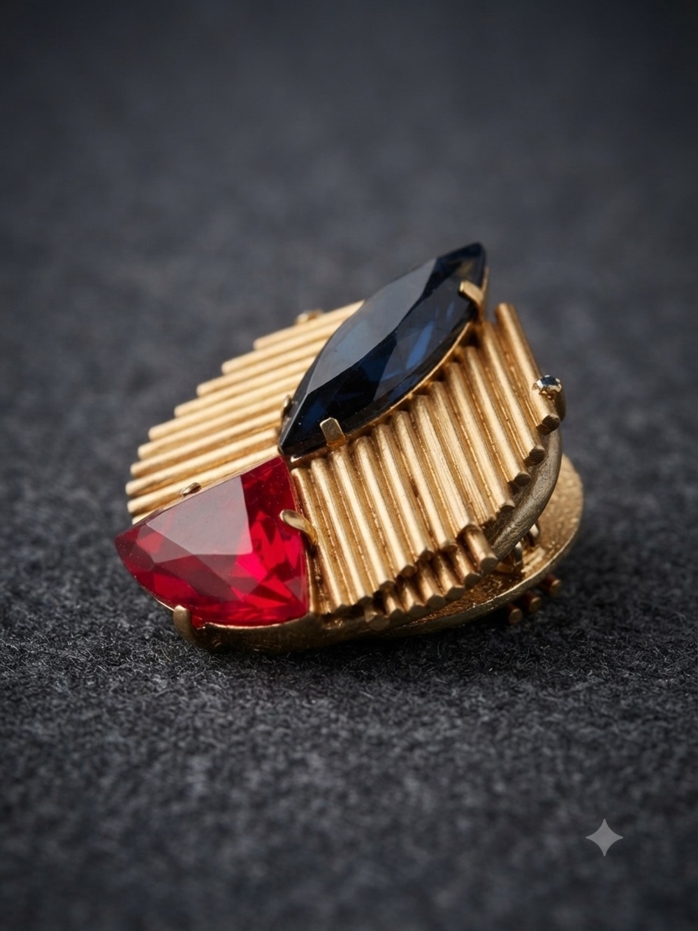 Vintage Retro Asymmetrical Structure Brooch with Red and blue faceted Stones.